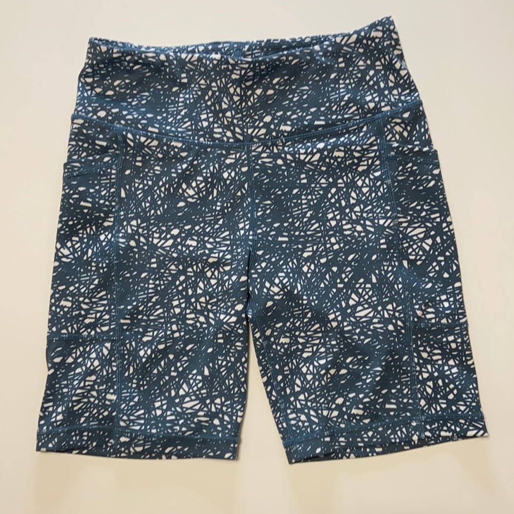 Senita athletic biker shorts that are white and blueish grey in color.